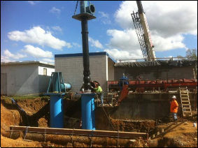 Industial water service pipes being installed