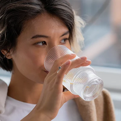 Woman drinking a glass of water